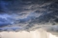 Light in the Dark and Dramatic Storm Clouds background Royalty Free Stock Photo