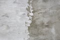 Light and dark grey divided in parts concrete damaged texture, wallpaper and background, close-up
