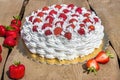 Light, delicate and tasty cream cake with fresh strawberries