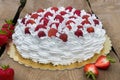 Light, delicate and tasty cream cake with fresh strawberries (half cake)