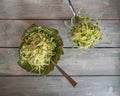 Light diet salad with fresh cabbage, cucumbers and herbs on a wooden table Royalty Free Stock Photo