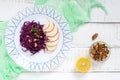 Light diet vegan salad of red cabbage, apple and walnuts. Royalty Free Stock Photo