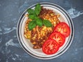 Light dietary vegetable breakfast. Cabbage pancakes and tomatoes. Royalty Free Stock Photo