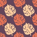 Light and drawk orange monstera leaves ornament seamless pattern. Purple background. Abstract design