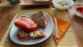 Light dry lunch on a ceramic plate. Ripe avocado diced.