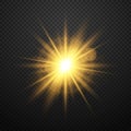 Light effect on a dark background. A sparkling golden glare, a twinkling star.