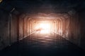 Light at the end of dark flooded sewer tunnel Royalty Free Stock Photo