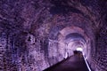 Light at the end of old brick railway tunnel Royalty Free Stock Photo