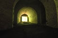 The Light at the End of the Tunnel. Abandoned Tarakaniv Fort in the summer day. Tarakaniv, Rivne oblast, Ukraine