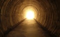 Light at the End of the Tunnel: A long tunnel with visible light at the end, symbolizing hope and liberation from pain Royalty Free Stock Photo