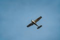 light-engine aircraft against a backdrop of blue skies at sunset Royalty Free Stock Photo