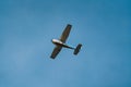 light-engine aircraft against a backdrop of blue skies at sunset Royalty Free Stock Photo