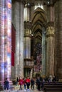 Marble pillars struck by the ray of light from the colored church window in Cathedral of Milan, Premonition