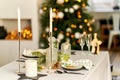 Light festive Christmas interior, set table for a festive dinner Royalty Free Stock Photo
