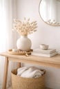 Minimal organic modern entryway console table with ceramic vase decor Royalty Free Stock Photo