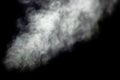 Light flow of steam on a black background