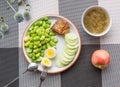 Light food containing broad beans, cucumbers, fish and eggs, mung bean soup is a drink Royalty Free Stock Photo