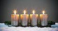 Light four advents candles with matches Royalty Free Stock Photo