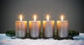 Light four advents candles with matches Royalty Free Stock Photo