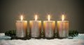 Light four advents candles with matches Royalty Free Stock Photo