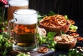 Light german beer poured into big glass, fresh green hops and bo Royalty Free Stock Photo