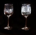 Light glass with beautiful silver pattern on a black background Royalty Free Stock Photo