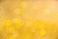 Light gold yellow bokeh sparkle glitter with soft color patterns for Christmas festival or Happy new year background Royalty Free Stock Photo