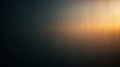 Light gradient creating warm colors on textured surface