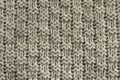 Light gray with black melange knitted wool fabric texture. Macro. Closeup Royalty Free Stock Photo