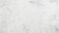 A light gray concrete wall with a minimalist texture, featuring small blemishes and cracks. The Royalty Free Stock Photo