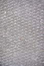 Light gray concrete wall, with rhombic pattern Royalty Free Stock Photo