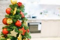 Light gray kitchen interior as blurred background and red with gold christmas Royalty Free Stock Photo