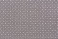 Light gray polka dot fabric texture background. Royalty Free Stock Photo