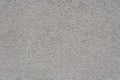 Light gray stucco wall. Textural background. Royalty Free Stock Photo