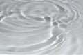 Light gray transparent clear calm water surface texture with splashes, waves and bubbles. Trendy abstract nature