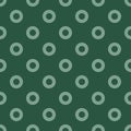 Light green circles on green seamless background