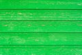 Light green natural boards with cracked paint structure, horizontal timber