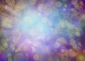 Gold purple blue green bokeh light burst background