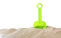 Light green plastic toy shovel on pile of sand Royalty Free Stock Photo