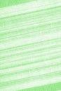 Light green textile abstract background with diagonal stripes, linen cotton fabric texture, bright blank with copy space Royalty Free Stock Photo