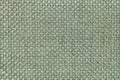 Light green textile background with checkered pattern, closeup. Structure of the fabric macro. Royalty Free Stock Photo