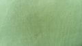 Light green woven coarse material, similar to canvas, linen or thick cotton. Thick fabric for upholstery, for bedspreads and Royalty Free Stock Photo