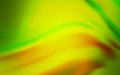 Light Green, Yellow vector blurred shine abstract background. Royalty Free Stock Photo
