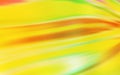 Light Green, Yellow vector blurred shine abstract background. Royalty Free Stock Photo