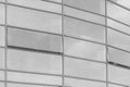 Light grey glass reflects cloudy sky modern building facade exterior office texture background Royalty Free Stock Photo