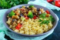 Light healthy dietary vegan dish: couscous and vegetables