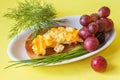 Light, healthy and nutritious snack with toast, eggs ,herbs and grapes