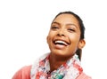 Light hearted lady. Close up of a laughing young woman against a white background.