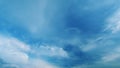 Light High Clouds Slide On Sky. Puffy Fluffy White Clouds Sky. Blue Sky With Clouds Moving In Opposite Direction And Sun Royalty Free Stock Photo