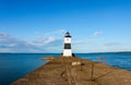 Light house on at the end of the dock on Lake Erie Royalty Free Stock Photo